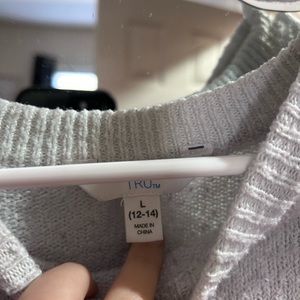 White, purple , pink and navy blue sweater